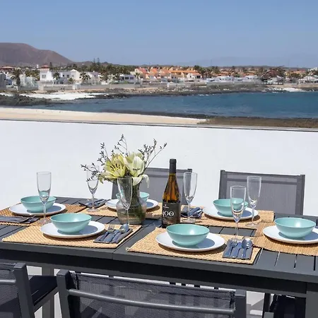 Family 6 Beachfront By Holidays Apartment